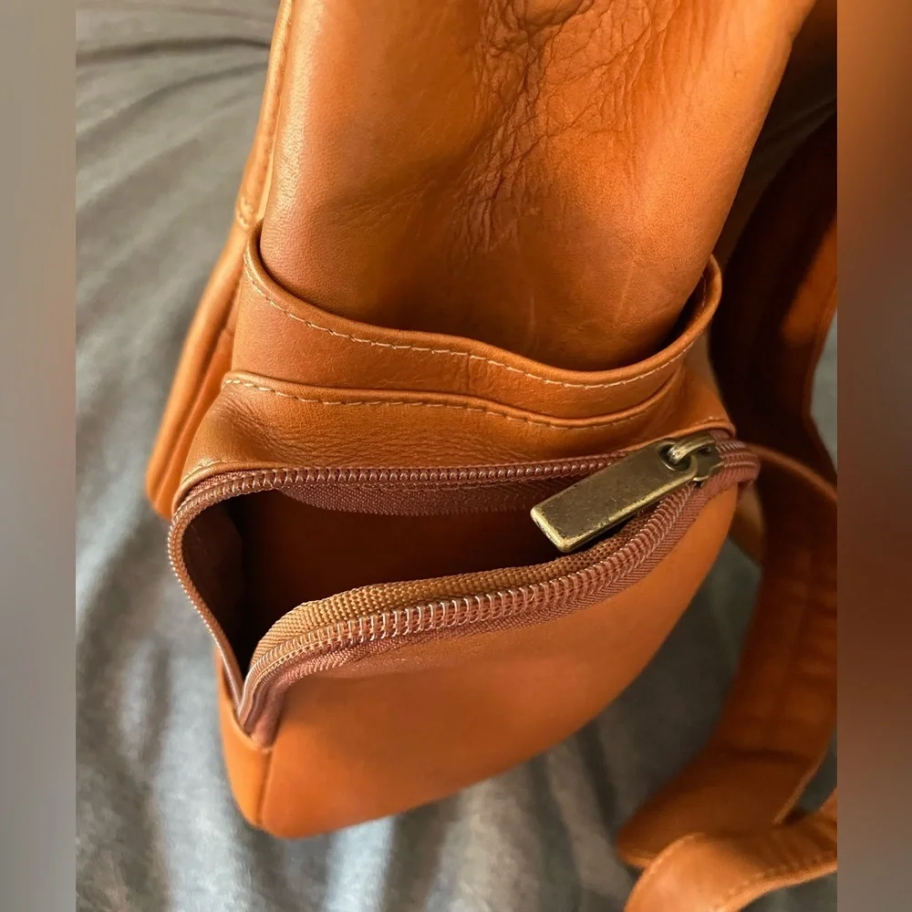 Le Donne Genuine Leather Multi-Pocket Backpack